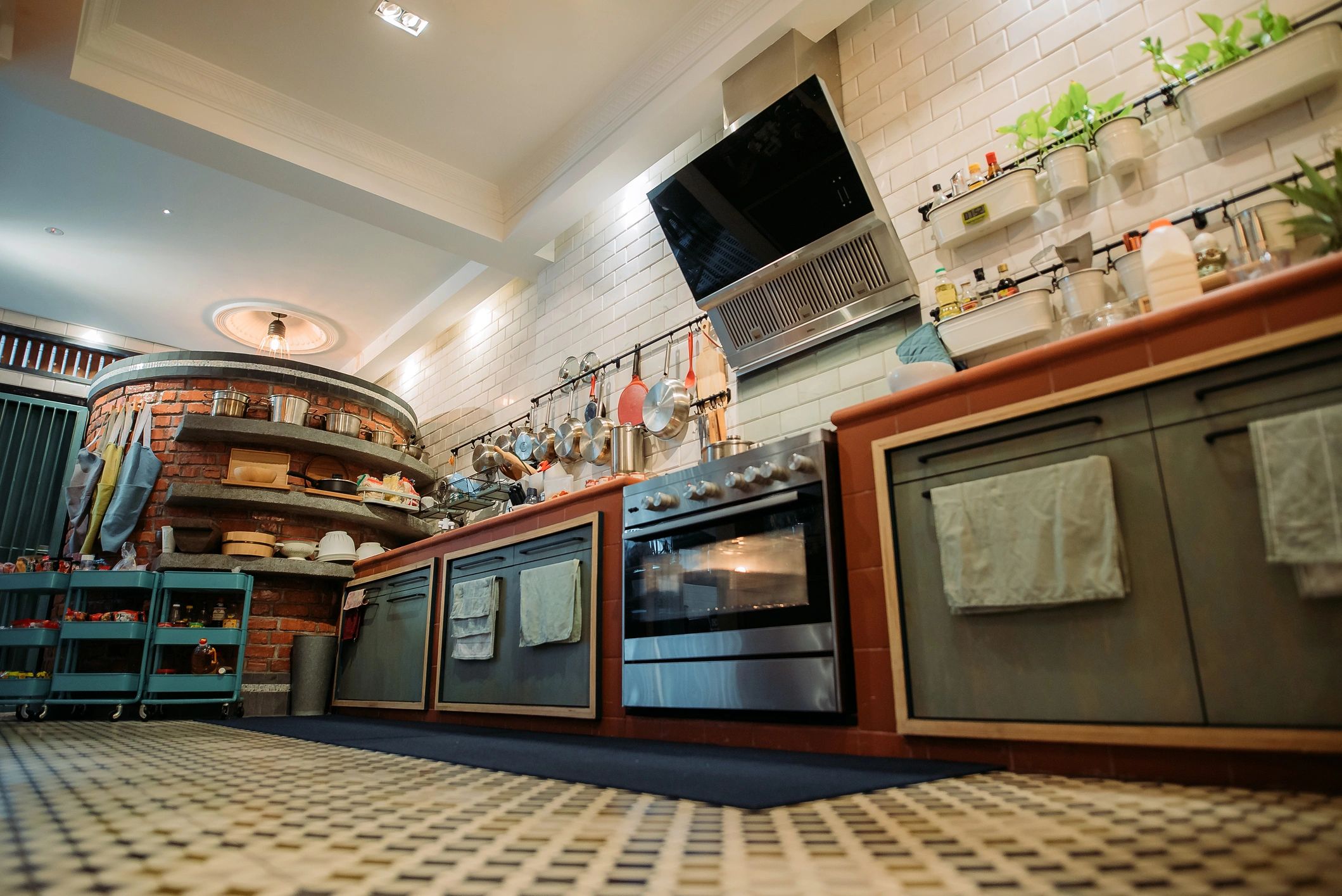 Modern kitchen with stove and cooker hood