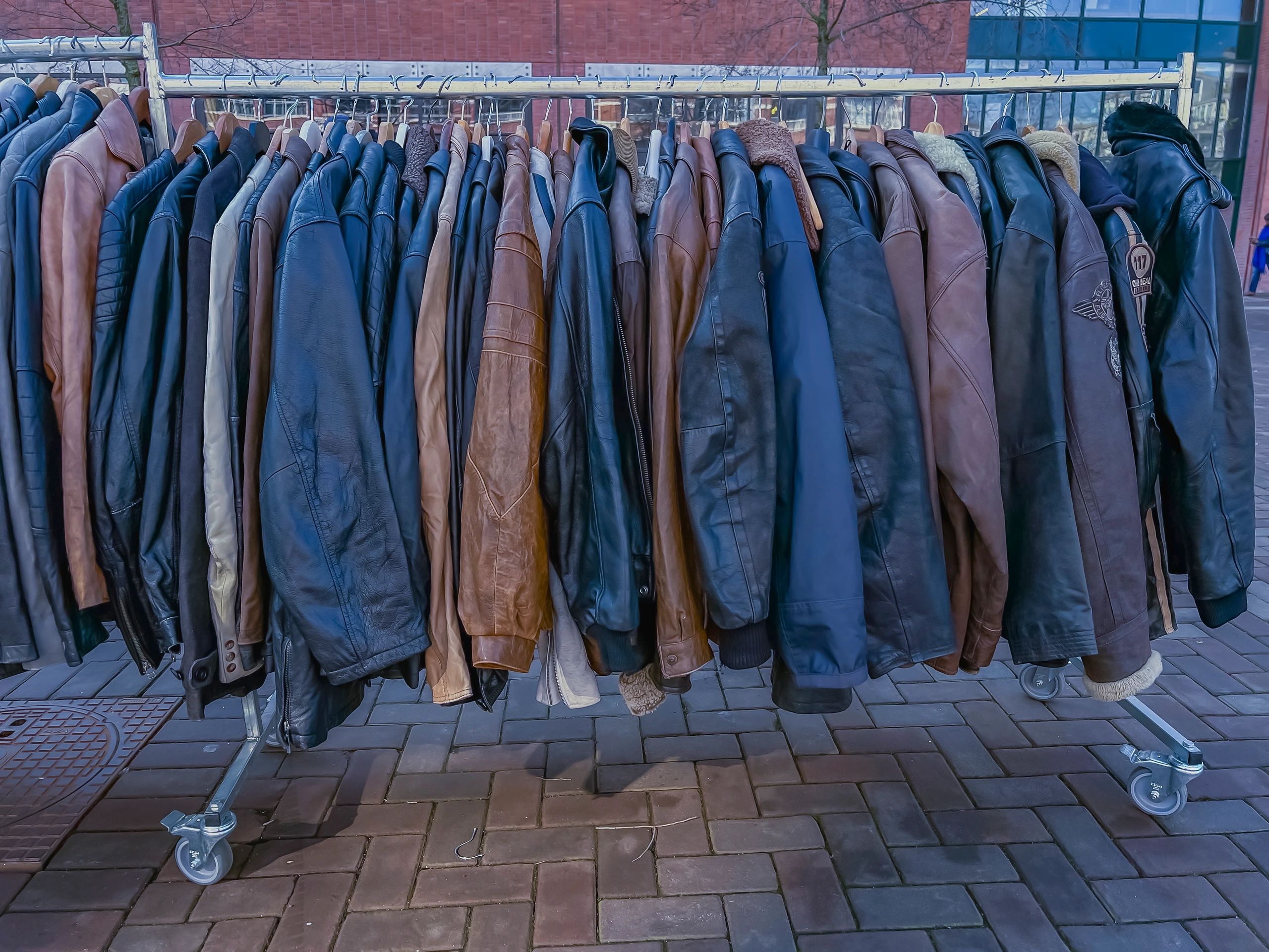 Freestanding clothes rack with hanging jackets