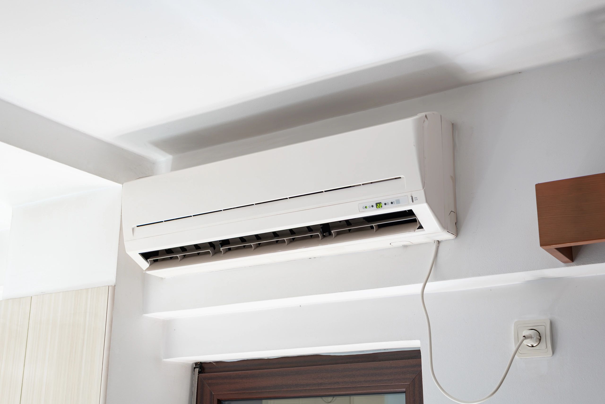 Wall-mounted air conditioning unit in a home